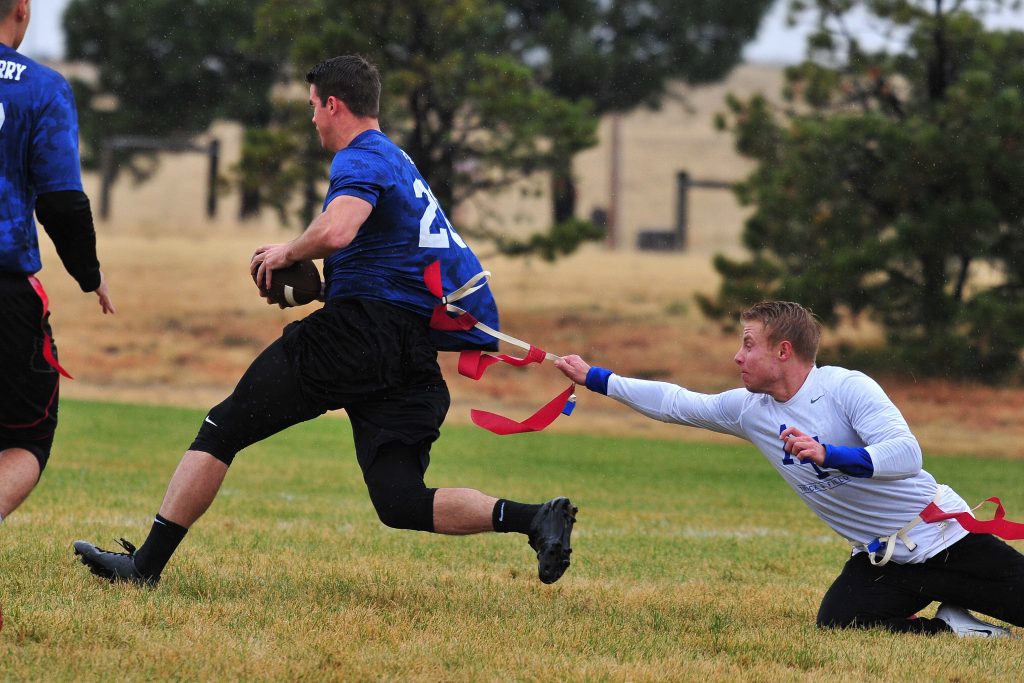 SCHRIEVER AIR FORCE BASE, Colo. -- The 50th Operations Support Squadron defeated the 4th Space Operations Squadron to claim the Wing Flag Football championship at Schriever AFB, Colorado 24 October, 2018. (U.S. Air Force Photo/Dennis Rogers)